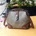 Vintage bluish grey doctor bag with brown handles and bronze rivet details - Gray