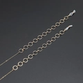 Golden eyewear and mask chain featuring large round links and anti-slip silicone loops - Chain Style / Gold