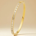 Brushed gold bangle with rectangular pavé zircons and a secure invisible clasp closure - Baguette Cut Gold Style (44-E-3)