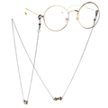 Cadena punk de bronce para gafas con lazo y anillos antideslizantes sobre blanco - Bronce