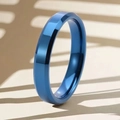 Faceted blue stainless steel ring with a modern minimalist design and glossy finish - US 7 / 4mm / Double Beveled Blue