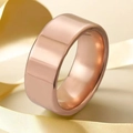 Polished 10mm wide rose gold stainless steel ring displayed on elegant silk ribbons - Size 6 / Rose Gold (8mm)