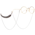 Retro gold round glasses with silver feather pendant chain for stylish eyewear support - Silver Feather Style