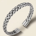 Macro shot of silver twisted wire stainless steel bangle with woven texture and square tips - Silver Steel Color (39乙-E-9)