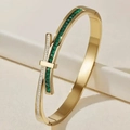 Golden stainless steel bangle with square emerald and zircon inlay in a crossed design - Gold-Tone Green Faux Bow Design with Rhinestone Row (39-C-11)