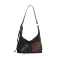 Detalle de bolso hobo negro con parche de borreguito y correa marrón ajustable - Negro