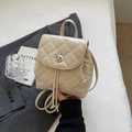 Chic cream quilted mini backpack with diamond pattern and silver twist lock detail - Off-white