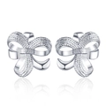Silver bow stud earrings with sparkling pave-set cubic zirconia on a white background - Pave Cubic Zirconia Bowknot Style / Silver