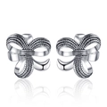 Elegant silver bow stud earrings featuring polished finish and vintage texture - Retro Oxidized Granular Texture Style / Antique Silver