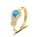 Adjustable gold plated ring with pear-shaped blue stone and white zircon accents - Adjustable Open / Gold Color - Blue Zirconia