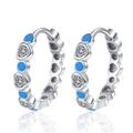 Silver evil eye huggie earrings with alternating blue enamel and heart-shaped zircons - Light Blue