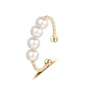 Golden C-shaped ear cuff with four elegant white pearls and textured rhombus pattern - Adjustable Open / Gold