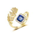 18K gold plated leaf ring featuring a square blue zircon and pavé crystal feather design - Adjustable Open / Gold Tone - Blue Zircon