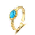 Verstellbarer goldener Retro-Ring mit ovalem Türkisstein und feiner Federstruktur - Einstellbar Offen / Gold