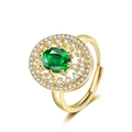 Adjustable golden ring with an emerald green oval zircon and sparkling white crystals - Adjustable Open / Gold Color - Green Zirconia