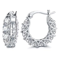 Elegante zilveren U-vormige creolen met briljante pavé gezette ronde zirkonia steentjes - Witgoud