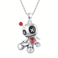 Gothic voodoo doll necklace with red heart gemstone and silver link chain on white background - Voodoo Doll Pendant Necklace