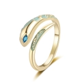 Detail of snake ring with blue marquise gemstone and green enamel wave patterns - Gold