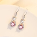 Elegant silver-plated drop earrings with pink gemstone and crown detail design - Platinum Color-Pink Stone