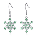 Silver snowflake earrings with green gemstone pavé on a pure white background - Green Zirconia