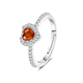 Detail of silver heart ring with orange center stone and sparkling pavé zircon setting - Adjustable Open / Orange Red Zirconia