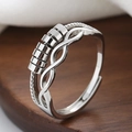 Anello antistress in argento con perline rotanti e fascia aperta intrecciata regolabile - Aperto Regolabile / Oro Bianco