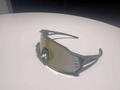 Detail van gouden sportlens met zijdelingse ventilatiegaten tegen beslaan van de bril - Grijs Frame Thee Gespiegeld