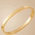 Polished gold 8mm stainless steel bangle with hinge clasp closure and minimalist finish - Golden Oval Bangle 6mm