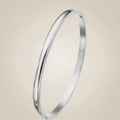 Minimalist 8mm wide polished stainless steel bangle in a shiny silver mirror finish - Curved Steel 4mm Bangle (40-A-1)