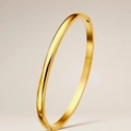 Polished 8mm gold-tone stainless steel clasp bangle with a minimalist smooth surface - Curved Gold 4mm Bangle (40-A-3)