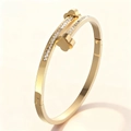 Gouden roestvrijstalen armband met fonkelende zirkonia pavé en klavermotieven - Gouden Dubbele Klaver Stijl (43乙-A-6)
