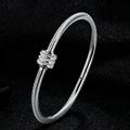 Bracciale a quadrifoglio in acciaio inox argento con zirconi e design ovale aperto - Stile Acciaio Lock