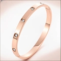 Elegant rose gold titanium steel bracelet featuring four circular sparkling zircon stones - KJ Rose Gold Four Diamonds Groove Style