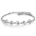 Silver geometric cube bracelet featuring sparkling zircon stones and adjustable chain - White Gold