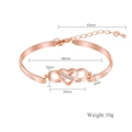 Bracciale infinito a cuore in oro rosa con pietre bianche e chiusura a moschettone - Oro rosa