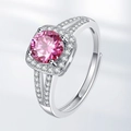 Elegant adjustable open ring featuring a large pink zircon center stone with halo setting - Adjustable Open / Silver Ring With Pink Zirconia