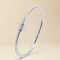 Sleek silver stainless steel evil eye hinge bracelet with pavé cubic zirconia accents - Steel Color Slim Waist Paved Zirconia