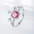 Elegant crown ring with a sparkling pink center stone and silver-tone gemstone setting - Adjustable Open / Pink Zirconia