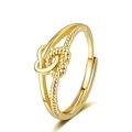 Adjustable golden twist ring featuring a polished finish and intertwined double heart knot - Adjustable Open / Gold