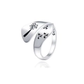 Detail shot of S925 sterling silver dandelion ring with polished finish and logo stamp - Adjustable Open / Dandelion