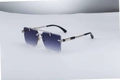 Detailed close-up of blue gradient lenses and silver metal woven temple on rimless sunglasses - Silver Frame Double Grey Lenses