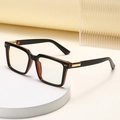 Fashionable square frame glasses in black and amber with gold metallic temple details - Square Frame With Metal Decoration (ZS-95020) / Bright Black Frame / Turn Grey Lens (C1)