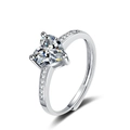 Detail of heart-shaped pink zircon ring with adjustable band and side stones - Adjustable Open / White Zirconia