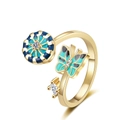 Adjustable golden ring featuring rotating enamel butterfly and turquoise charms - Adjustable Open / Gold