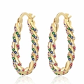 Chic twisted gold hoop earrings with colorful pavé crystals on a clean white background - Gold