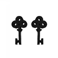 Minimalist black stainless steel key-shaped stud earrings with matte textured finish - Matte Black