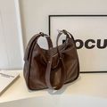 Borsa a secchiello vintage oversize in pelle marrone scuro con occhielli in argento - caffè