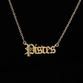 Close-up of gold Pisces zodiac pendant with gothic lettering and a delicate chain - Pisces Gold