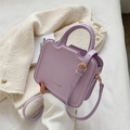Purple wave-structured PU leather handbag with adjustable strap and top handle - Purple