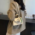 Retro beige leather Kelly style handbag with crossbody strap and woven ornament - Off White